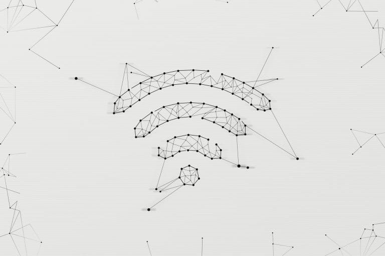 Wifi symbol made in low polygonal style over light background